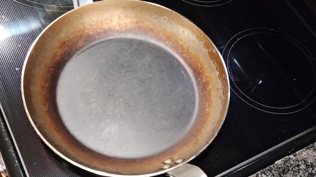 carbon steel pan on electric stove top