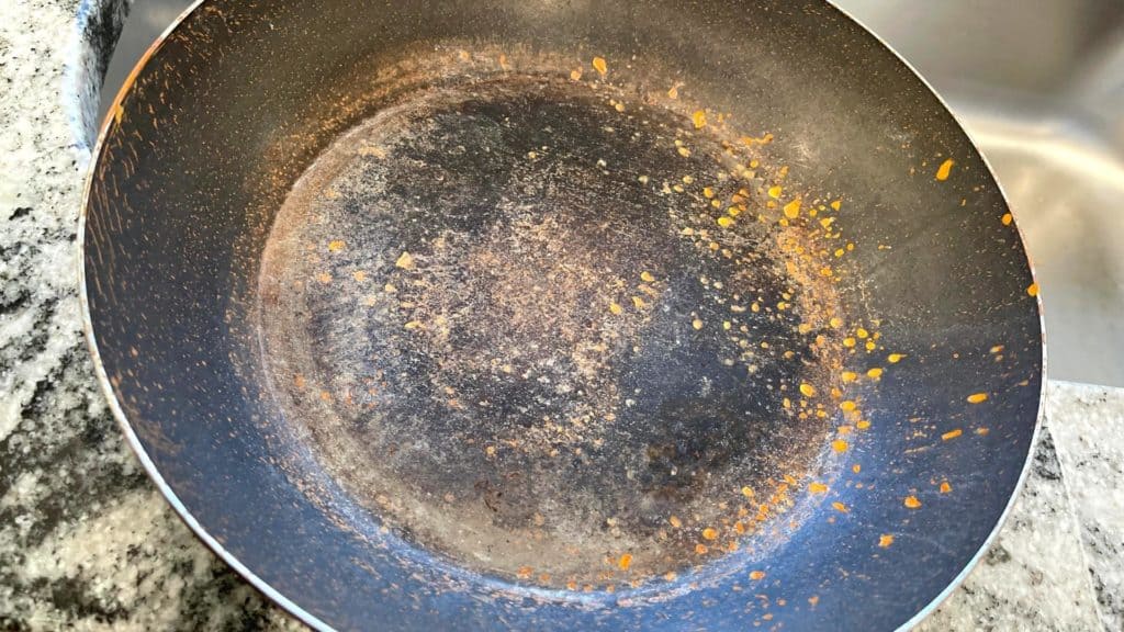 carbon steel pan with rust spots
