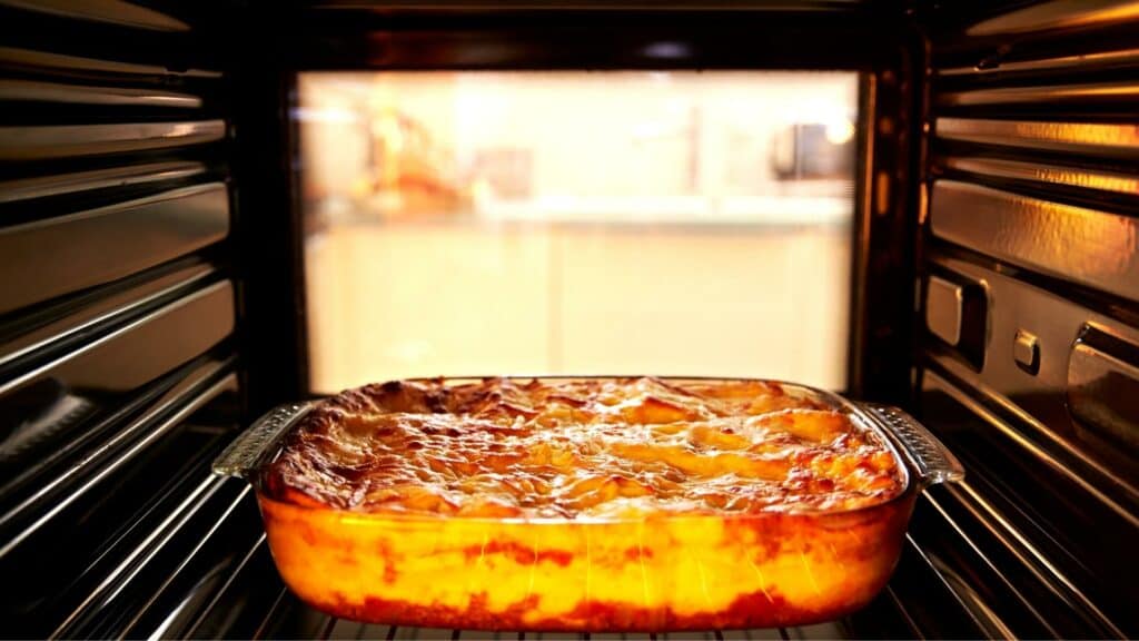 lasagna in glass dish go in the oven